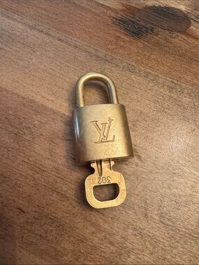 Louis Vuitton Gold Brass Padlock with Key